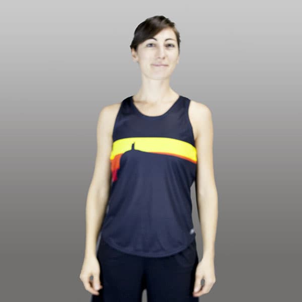 woman smiling wearing a black and yellow running singlet