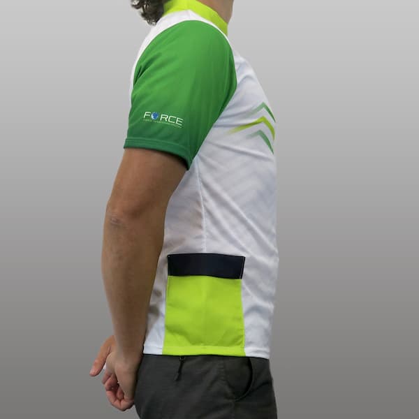 side of man wearing a white and green trekking jersey