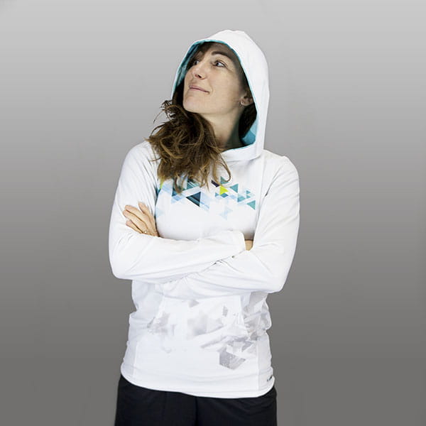 thumbnail woman wearing a white hoodie crossing arms