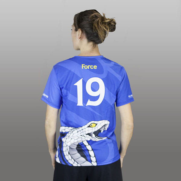 thumbnail back of woman wearing a blue sublimated jersey