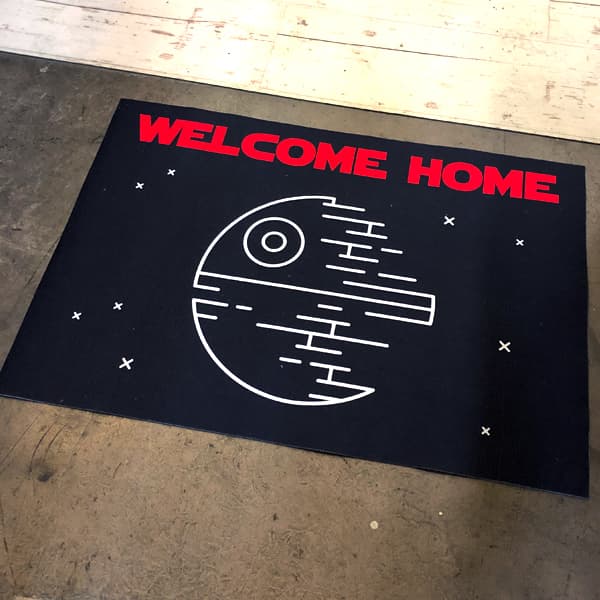 black star welcome home mat