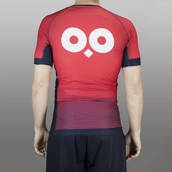 back of man wearing a red compression top #00