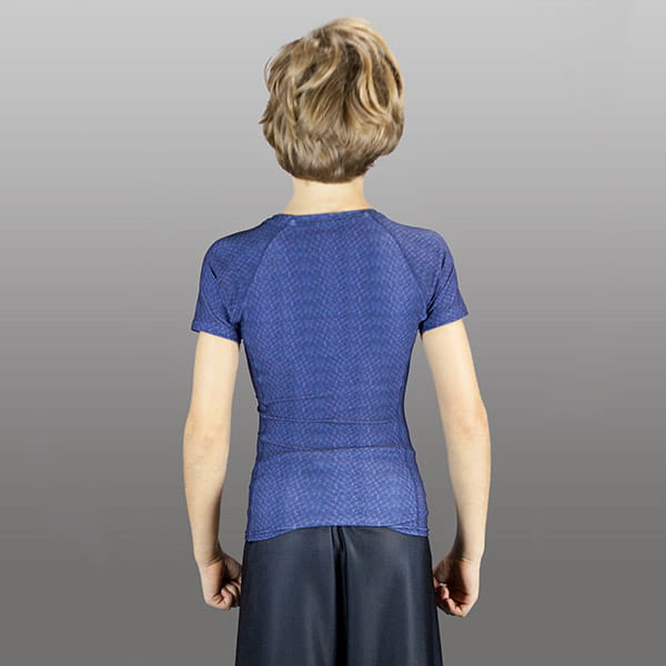 back of blond kid wearing a blue compression top