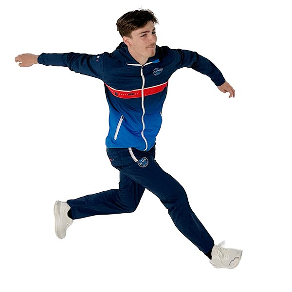 man about to jump wearing fully sublimated blue jacket and trousers
