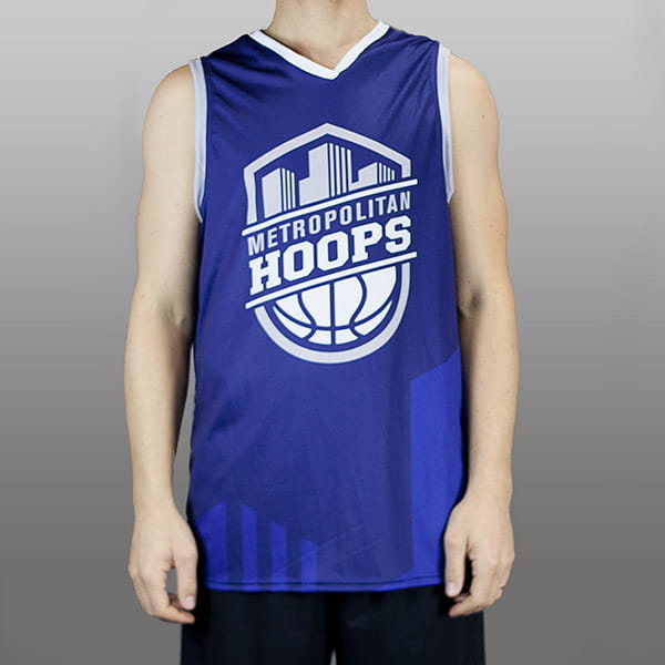 torso of man wearing a blue basketball jersey