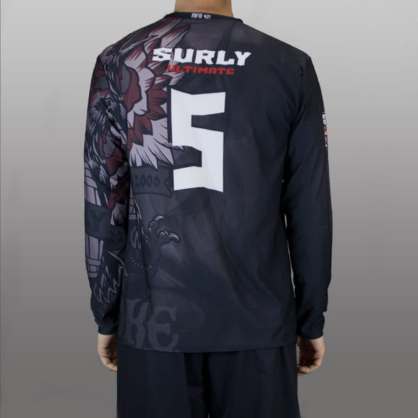 back of man wearing a black sublimated jersey with long sleeves #5