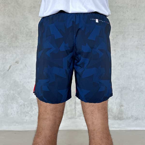 rear view of man legs wearing blue shorts