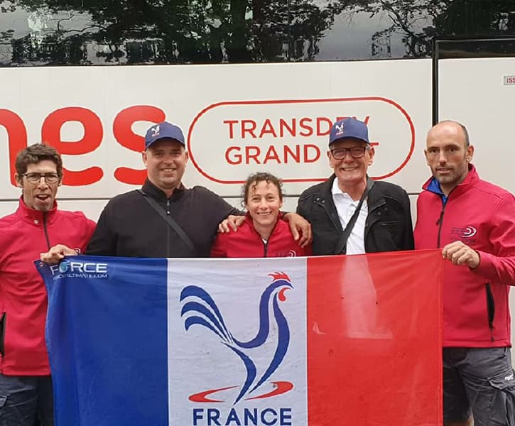 thumbnail france trainers wearing red softshell holding a french flag