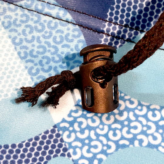 thumbnail black spring lock toggle on blue printed fabric