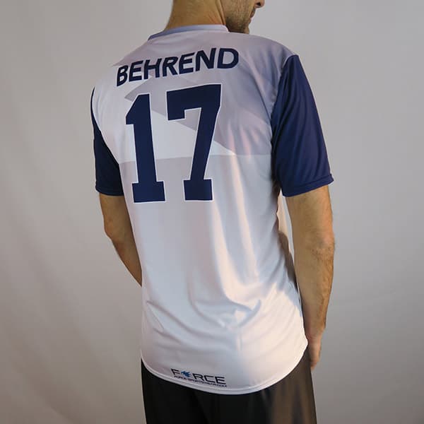 back of man wearing a white and blue volleyball jersey #17