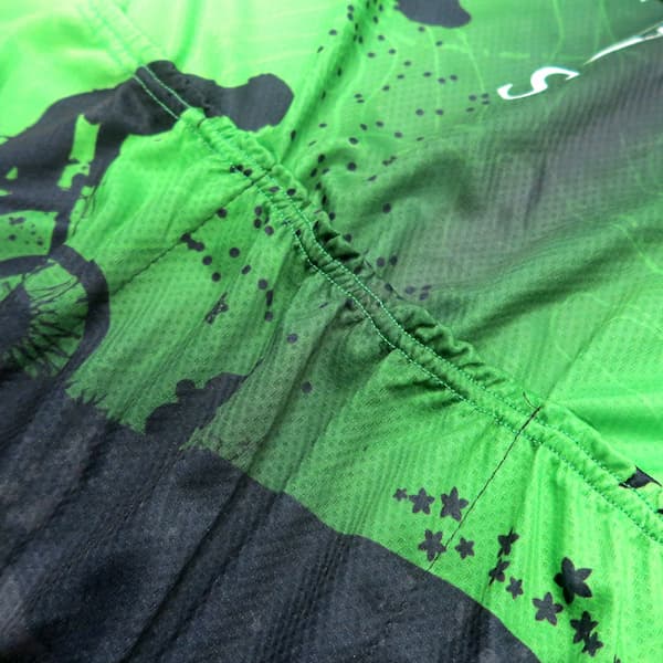 black and green sublimated fabric wrinkling