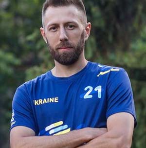 man with navy sports jersey